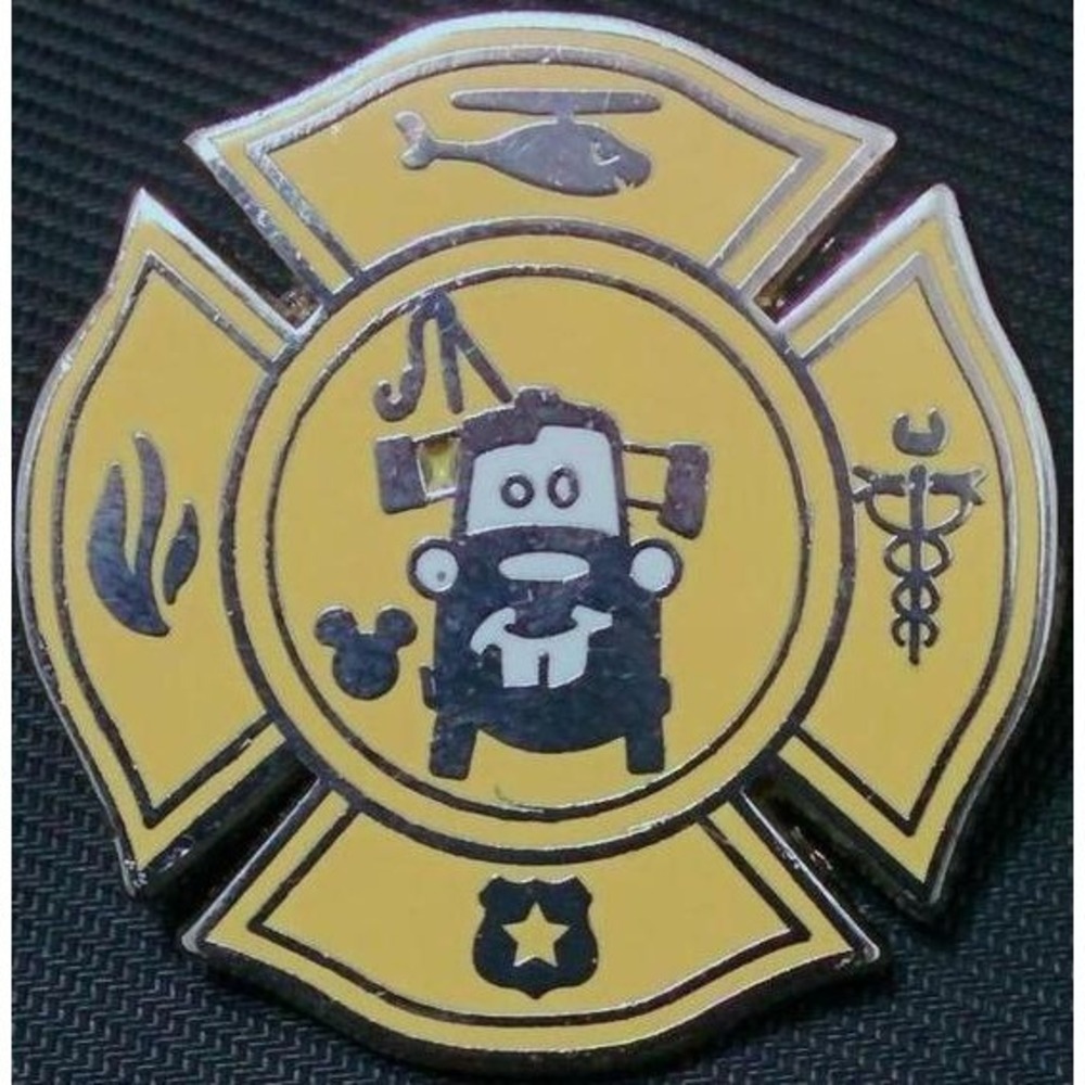 Disney Parks Pixar Cars Rescue Squad Mater Yellow Maltese Cross Enamel Pin